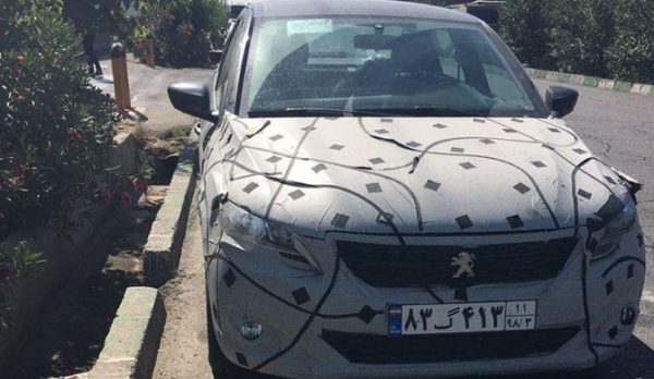 پژو ۳۰۱ تولید داخل با پوشش استتاری در حال تست در تهران (+عکس)